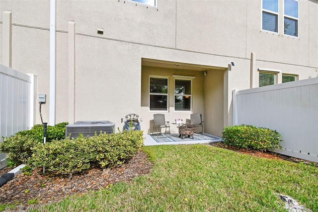6825 Citrus Creek Ln, Tampa, FL 33625 - doorway to property with a patio and stucco siding