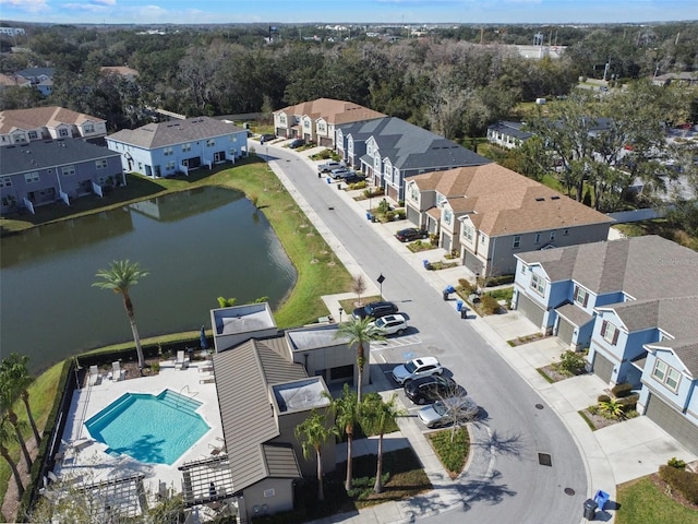 6825 Citrus Creek Ln, Tampa, FL 33625 - aerial perspective of suburban area with a nearby body of water and a pool