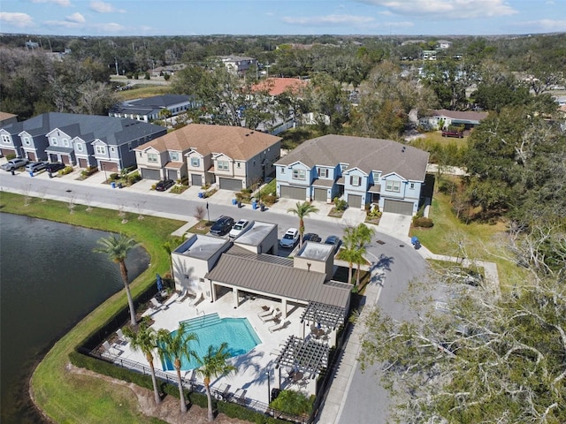 6825 Citrus Creek Ln, Tampa, FL 33625 - aerial view of residential area with a pool area and a large body of water