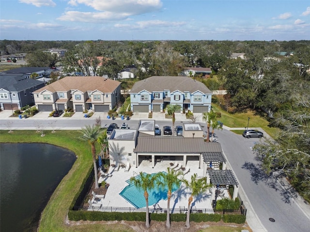 6825 Citrus Creek Ln, Tampa, FL 33625 - aerial view of residential area featuring a pool and a nearby body of water