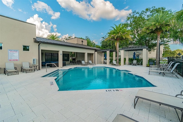 6825 Citrus Creek Ln, Tampa, FL 33625 - community pool featuring a patio