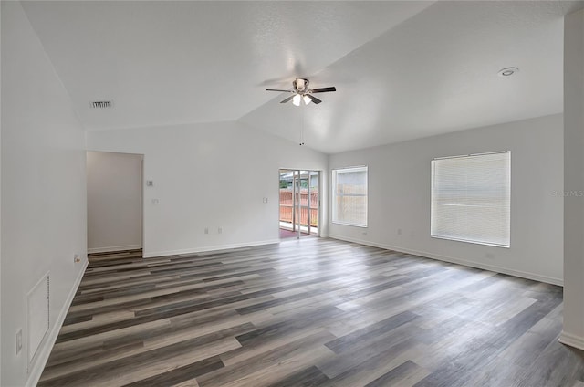 4129 Marlow Loop, Land O Lakes, FL 34639 - empty room with ceiling fan, lofted ceiling, and wood finished floors