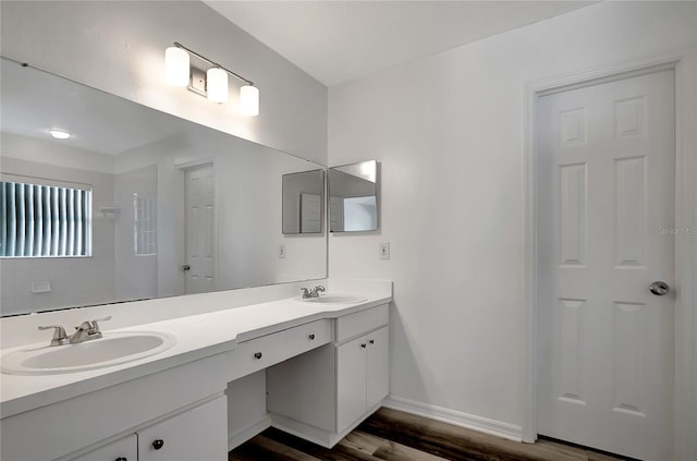 4129 Marlow Loop, Land O Lakes, FL 34639 - full bath featuring double vanity and wood finished floors