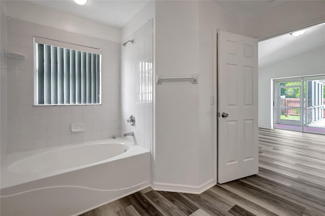 4129 Marlow Loop, Land O Lakes, FL 34639 - full bath featuring wood finished floors and tub / shower combination