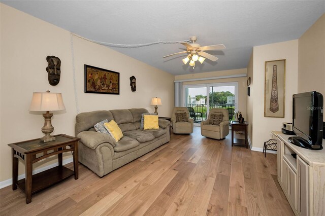 960 Virginia St Unit 204, Dunedin, FL 34698 - living area with light wood-style flooring and ceiling fan