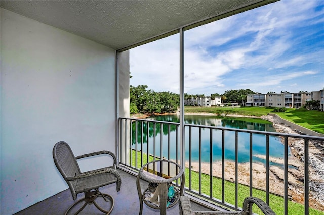 960 Virginia St Unit 204, Dunedin, FL 34698 - balcony featuring a water view