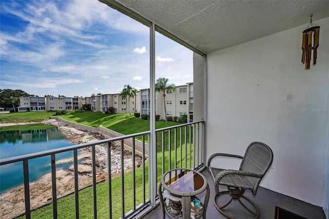 960 Virginia St Unit 204, Dunedin, FL 34698 - balcony featuring a water view