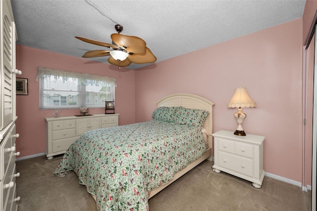 960 Virginia St Unit 204, Dunedin, FL 34698 - bedroom featuring carpet flooring, ceiling fan, and a textured ceiling