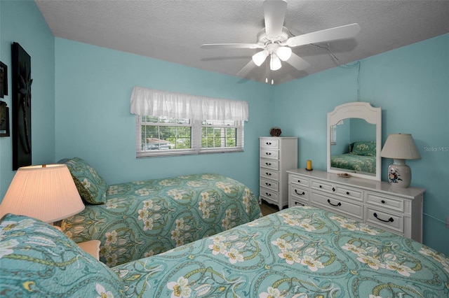 960 Virginia St Unit 204, Dunedin, FL 34698 - bedroom featuring a textured ceiling and ceiling fan