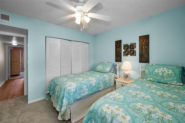 960 Virginia St Unit 204, Dunedin, FL 34698 - carpeted bedroom with a closet and ceiling fan