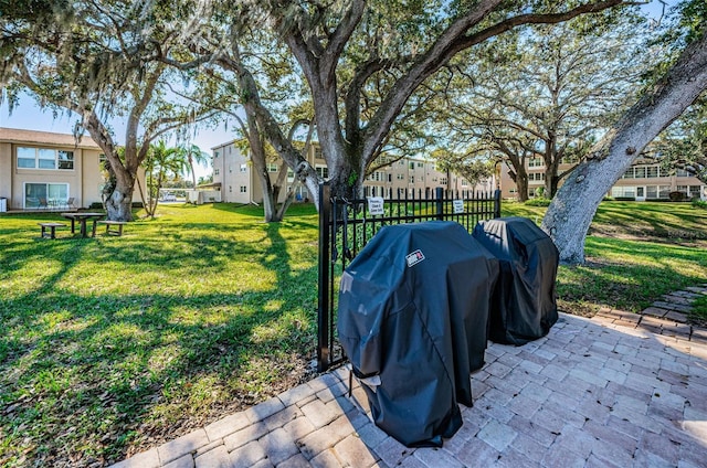 960 Virginia St Unit 204, Dunedin, FL 34698 - view of yard with a residential view and a patio