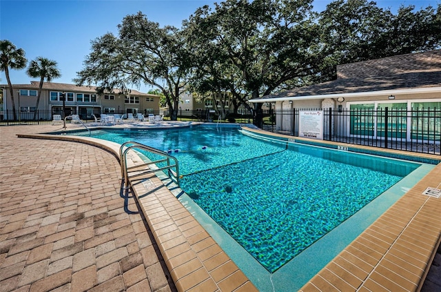 960 Virginia St Unit 204, Dunedin, FL 34698 - community pool with a patio