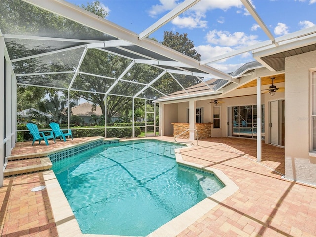18803 Misty Shores Ln, Lutz, FL 33548 - swimming pool with a patio area, a ceiling fan, and a lanai