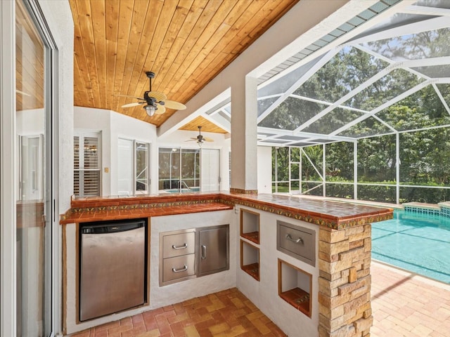 18803 Misty Shores Ln, Lutz, FL 33548 - view of patio featuring an outdoor kitchen, an outdoor pool, glass enclosure, and ceiling fan