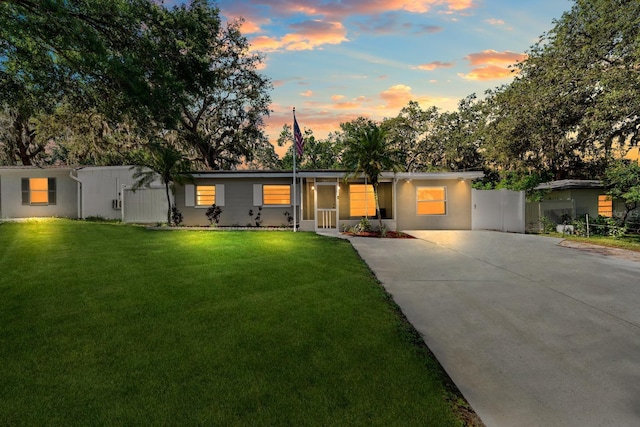7003 Yule Ln, Tampa, FL 33637 - ranch-style home with driveway