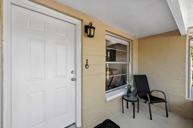 7003 Yule Ln, Tampa, FL 33637 - view of exterior entry with covered porch