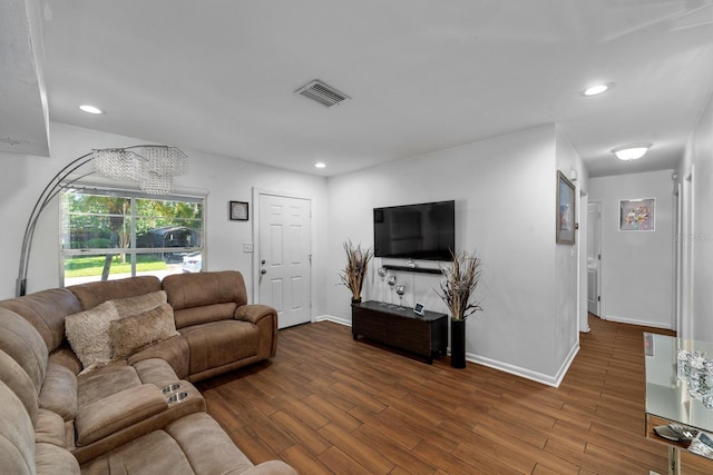 7003 Yule Ln, Tampa, FL 33637 - living room with wood finished floors and recessed lighting