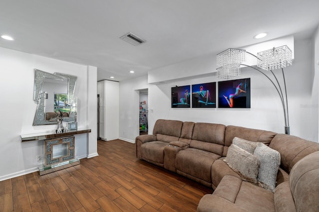 7003 Yule Ln, Tampa, FL 33637 - living area with recessed lighting and dark wood finished floors