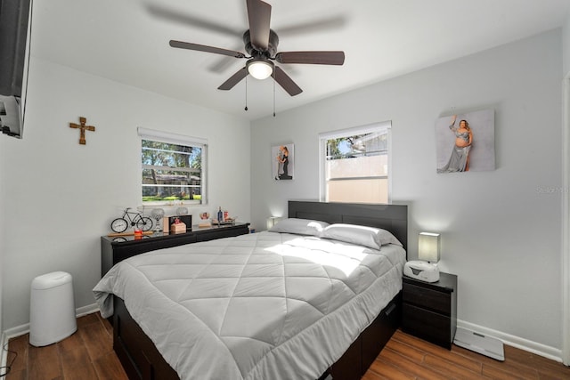 7003 Yule Ln, Tampa, FL 33637 - bedroom with wood finished floors and ceiling fan