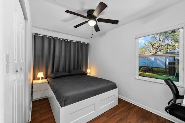 7003 Yule Ln, Tampa, FL 33637 - bedroom featuring wood finished floors and ceiling fan