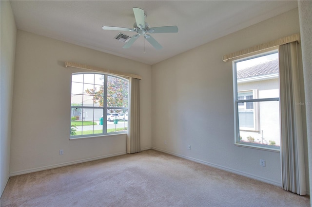 8354 Palmetto Ct, Englewood, FL 34224 - empty room featuring light colored carpet and ceiling fan