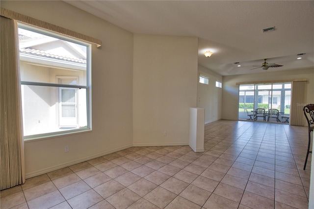 8354 Palmetto Ct, Englewood, FL 34224 - spare room with light tile patterned floors and ceiling fan