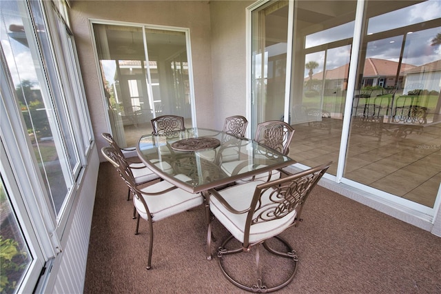 8354 Palmetto Ct, Englewood, FL 34224 - sunroom / solarium featuring carpet