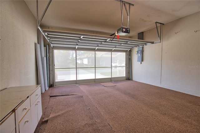 8354 Palmetto Ct, Englewood, FL 34224 - garage with a garage door opener, a textured wall, and electric panel