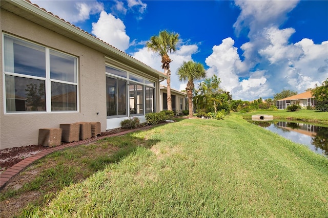 8354 Palmetto Ct, Englewood, FL 34224 - view of green lawn with a water view