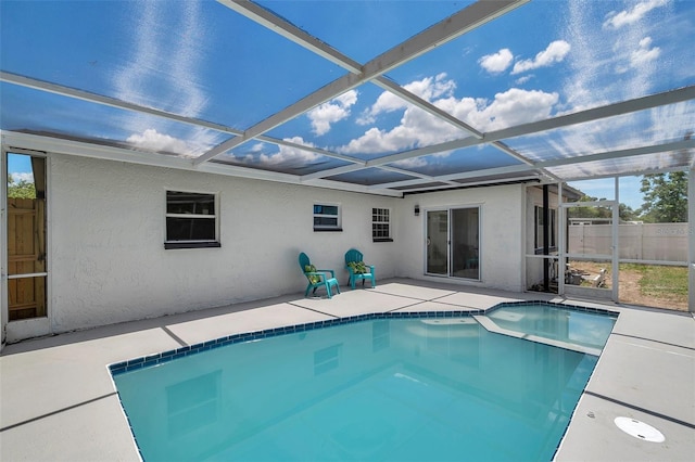 8045 Colton Dr, Port Richey, FL 34668 - view of pool featuring a patio, glass enclosure, and a pool with connected hot tub