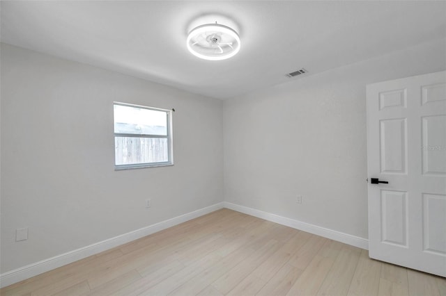 8045 Colton Dr, Port Richey, FL 34668 - unfurnished room featuring light wood-type flooring and baseboards