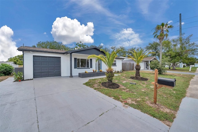 8045 Colton Dr, Port Richey, FL 34668 - ranch-style house featuring an attached garage and concrete driveway