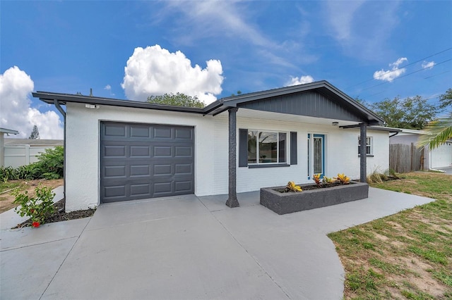 8045 Colton Dr, Port Richey, FL 34668 - ranch-style house featuring driveway and a garage