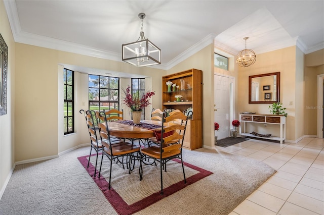 2925 Deerbrook Dr, Lakeland, FL 33811 - dining space featuring a chandelier, crown molding, light colored carpet, and light tile patterned floors