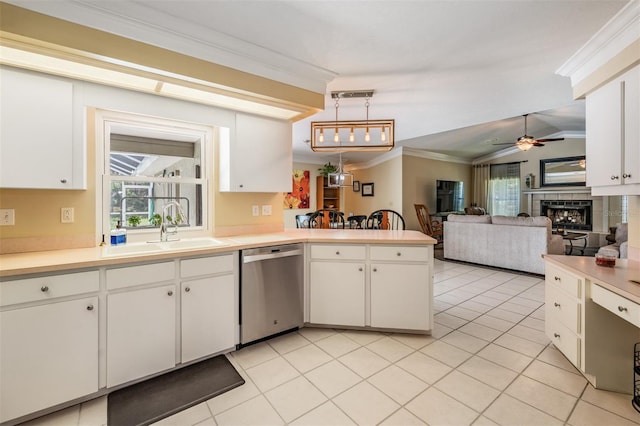 2925 Deerbrook Dr, Lakeland, FL 33811 - kitchen featuring stainless steel dishwasher, a peninsula, ornamental molding, healthy amount of natural light, and ceiling fan