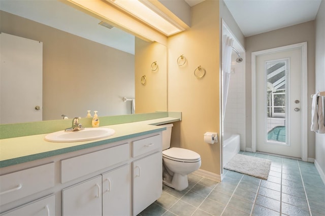 2925 Deerbrook Dr, Lakeland, FL 33811 - full bathroom with vanity, tile patterned flooring, and shower / bathtub combination