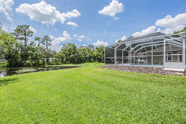2925 Deerbrook Dr, Lakeland, FL 33811 - view of grassy yard with a water view and a lanai