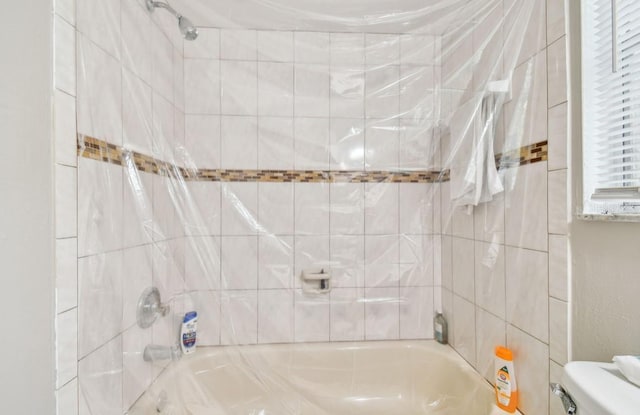 7920 N Marks St, Tampa, FL 33604 - bathroom featuring tub / shower combination