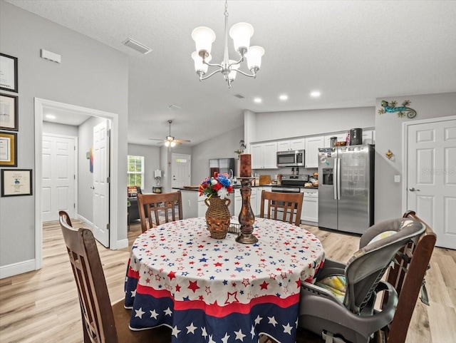 8737 N Spikes Way, Dunnellon, FL 34434 - dining area featuring light wood-type flooring, a chandelier, lofted ceiling, recessed lighting, and ceiling fan