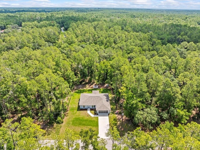 8737 N Spikes Way, Dunnellon, FL 34434 - aerial view of property and surrounding area with a forest