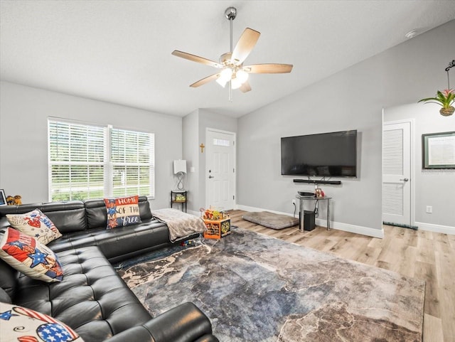 8737 N Spikes Way, Dunnellon, FL 34434 - living room with vaulted ceiling, wood finished floors, and ceiling fan