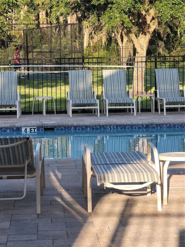 19239 Stone Hedge Dr, Tampa, FL 33647 - community pool featuring a patio