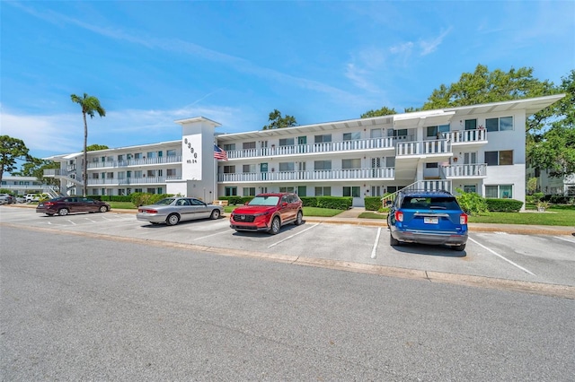 8396 111th St Unit 301, Seminole, FL 33772 - view of apartment building / complex with uncovered parking