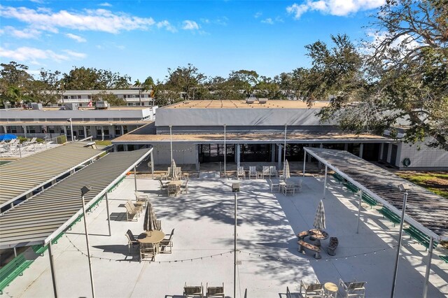 8396 111th St Unit 301, Seminole, FL 33772 - rear view of property featuring a patio area