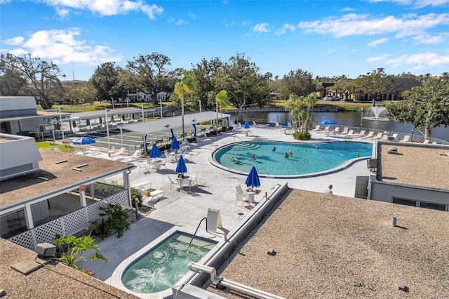 8396 111th St Unit 301, Seminole, FL 33772 - community pool with a patio area and a water view
