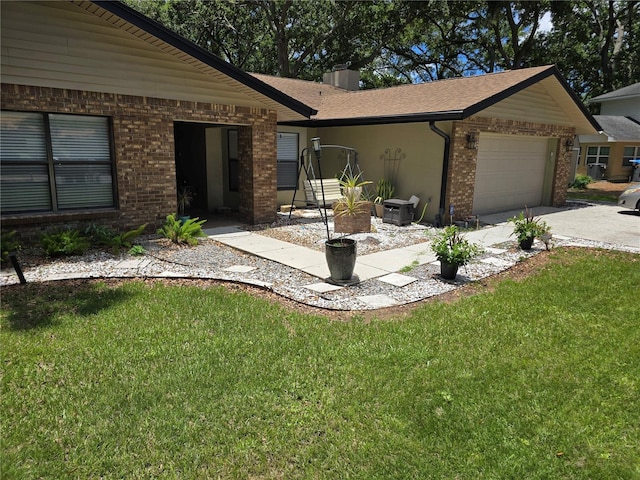 909 Heatherbrook Dr, Auburndale, FL 33823 - view of front facade with brick siding, a garage, a front yard, and driveway