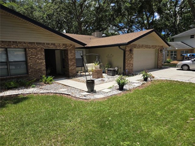 909 Heatherbrook Dr, Auburndale, FL 33823 - view of front of property with brick siding, a garage, concrete driveway, and a front yard