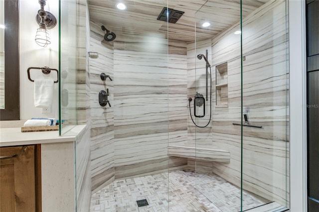 5353 Gulf Blvd Unit A402, St Pete Beach, FL 33706 - bathroom featuring recessed lighting, a shower stall, and vanity