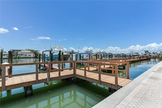 5353 Gulf Blvd Unit A402, St Pete Beach, FL 33706 - dock area with boat lift and a water view
