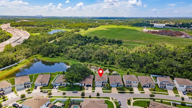8050 Praise Dr, Tampa, FL 33625 - aerial view of residential area with a nearby body of water and a local golf course